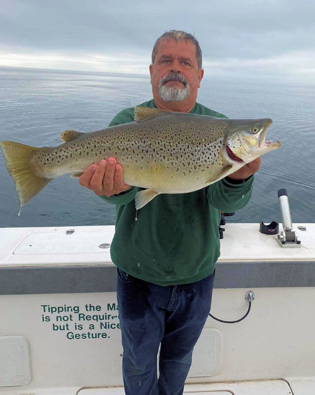 Customers fishing on Lake Ontario Fishing Charter